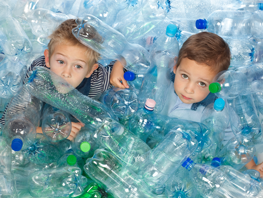 Kids in discarded bottles